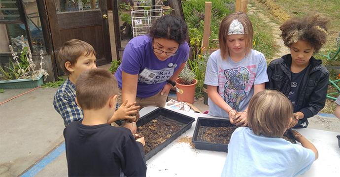 Tina Llopis working with NHM Summer Youth Day Campers