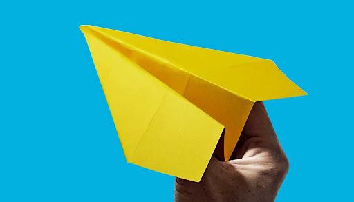 yellow paper airplane