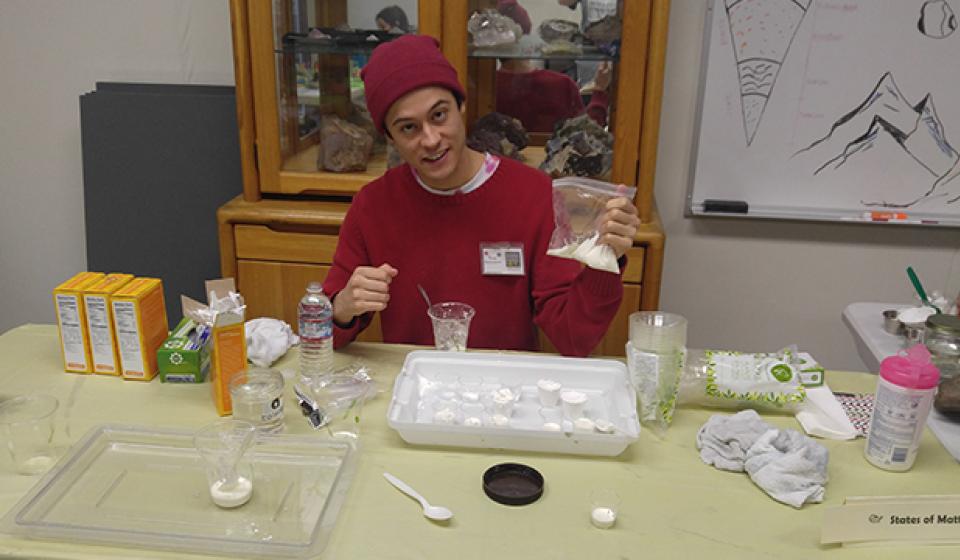 A student doing an experiment with baking soda